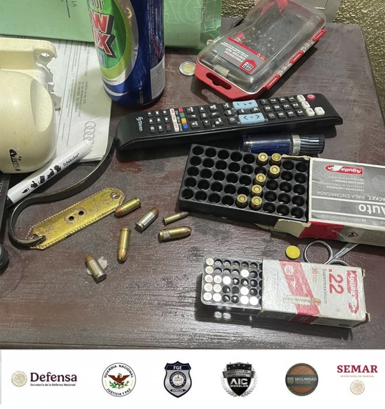 Dos capturados, armas droga y  cartuchos asegurados en cateo